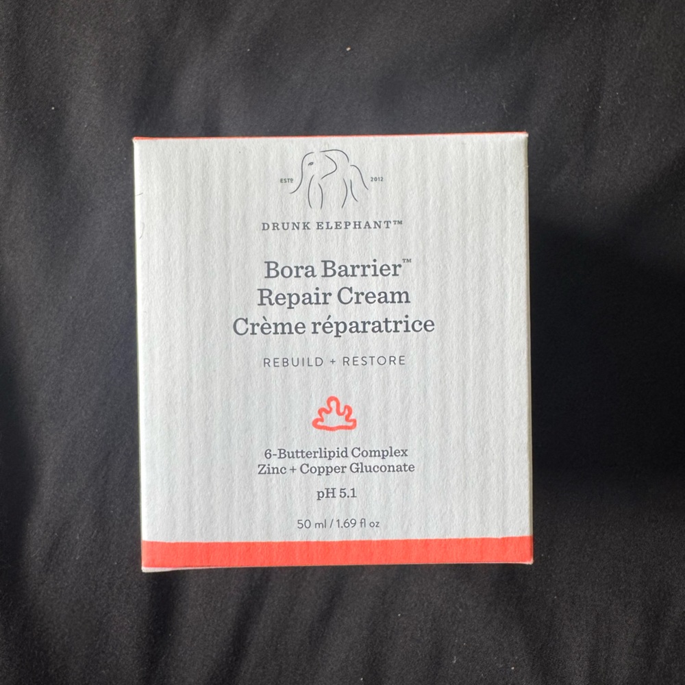 Drunk Elephant Bora Barrier Repair Cream in White and Red